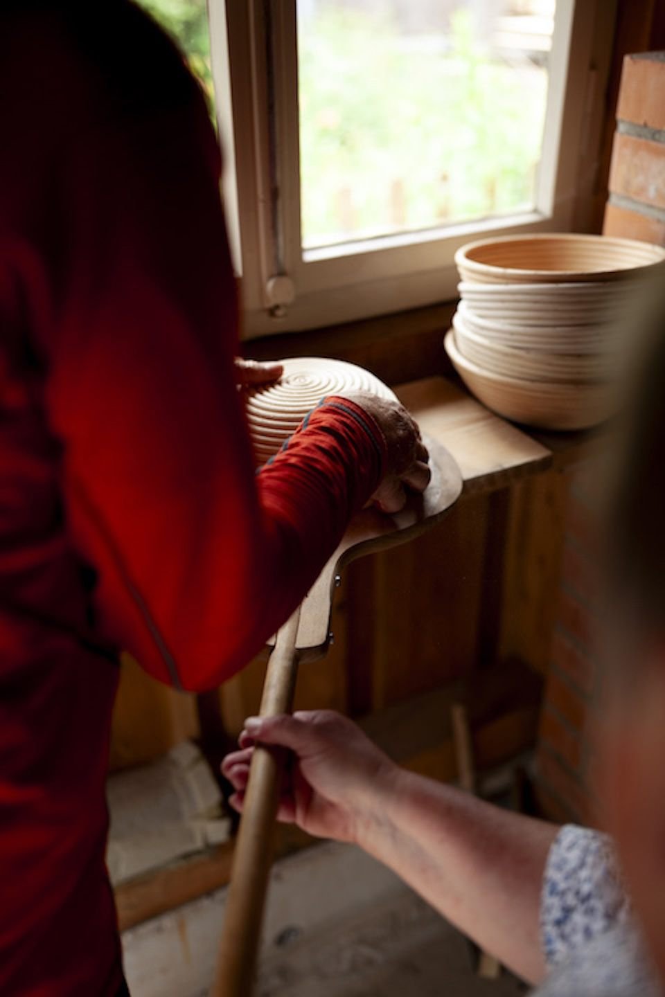 Putting bread in the oven (2024)