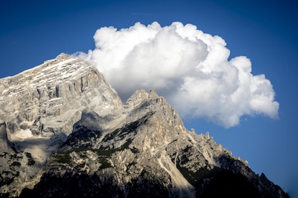 Cloud hiding behind mountain in Dolomiti San Vito Di Cadore (2024)